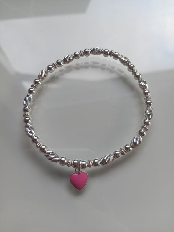 Texture bracelet with charm