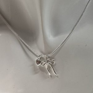 Pink heart and bow necklace 15-17” sterling silver